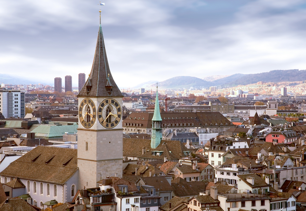 zurich skyline with the clock tower in the foreground